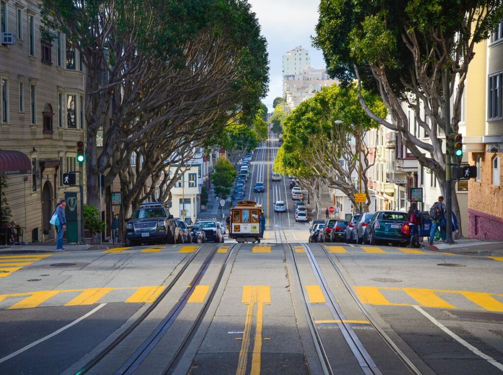 San Francisco cable car ascending a steep California city street